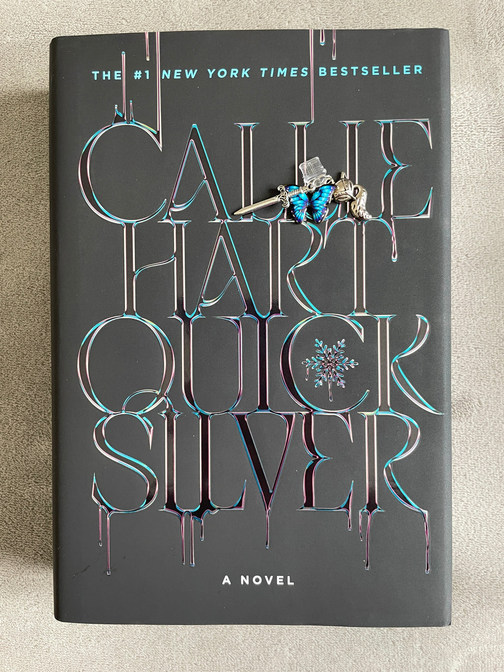 Quicksilver Kindle Charm