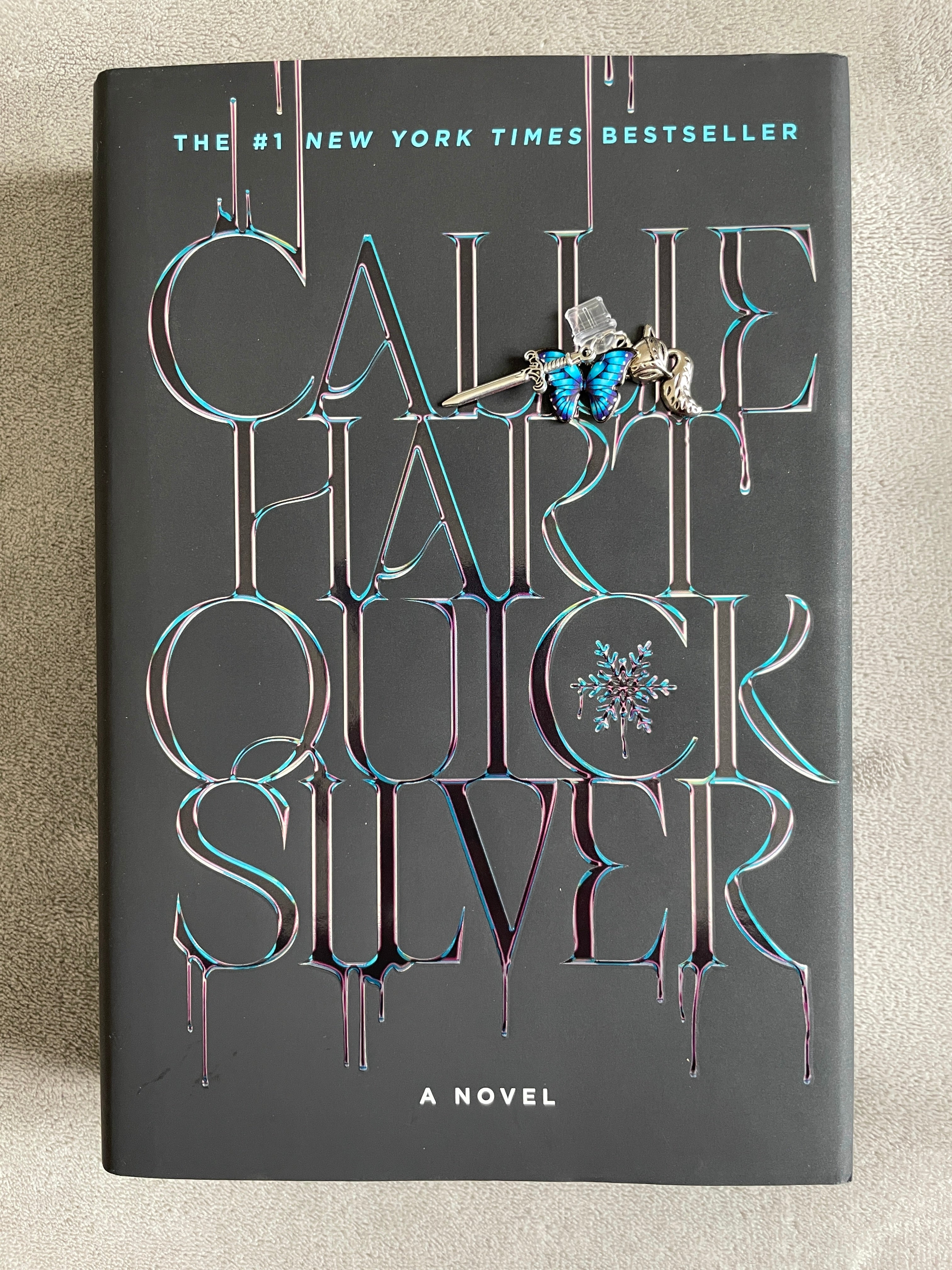 Quicksilver Kindle Charm