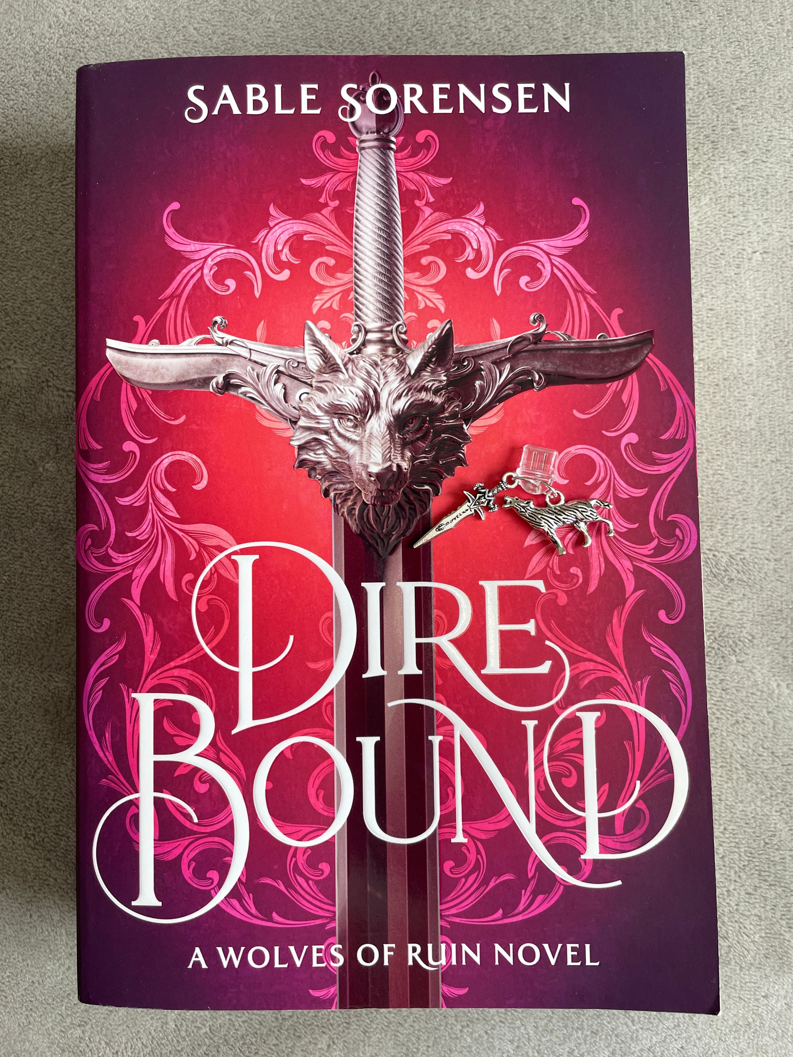 Dire Bound Kindle Charm