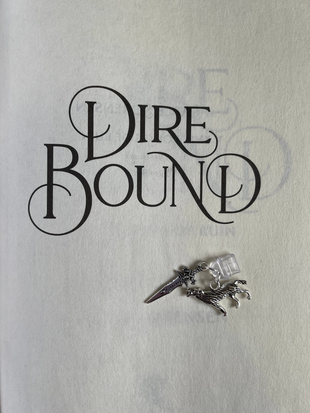 Dire Bound Kindle Charm
